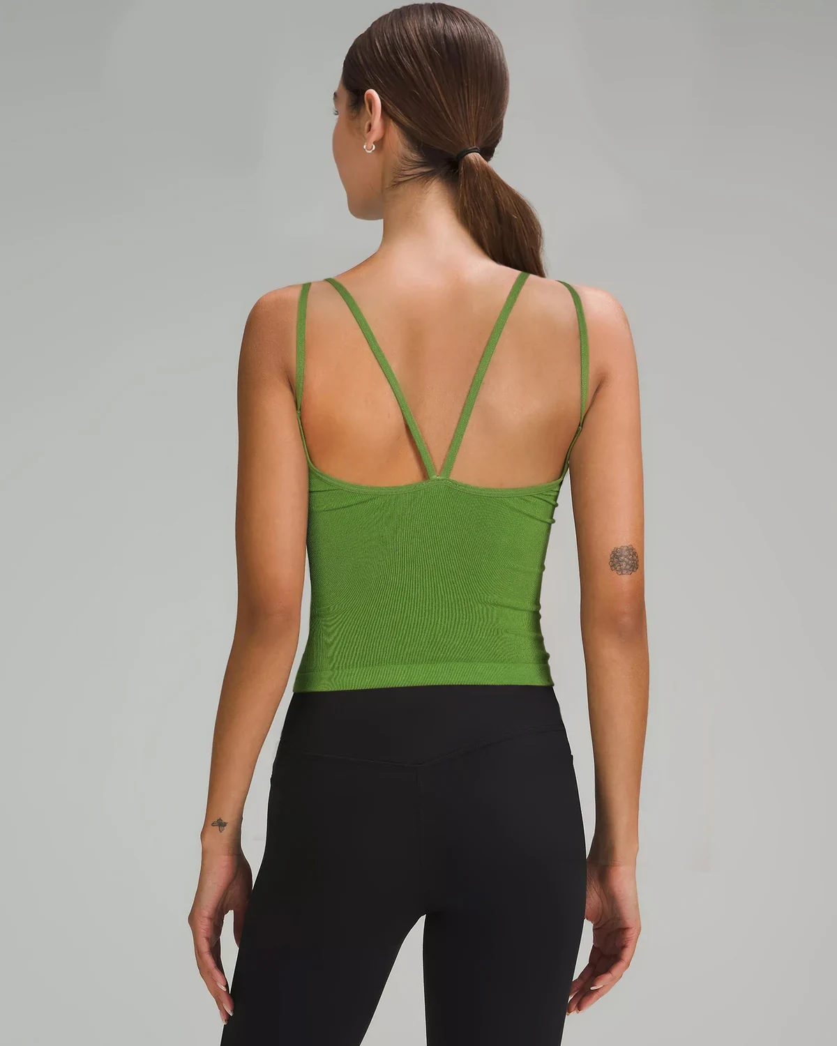 Women's seamless double-strap sports tank top with four-way stretch, styled view