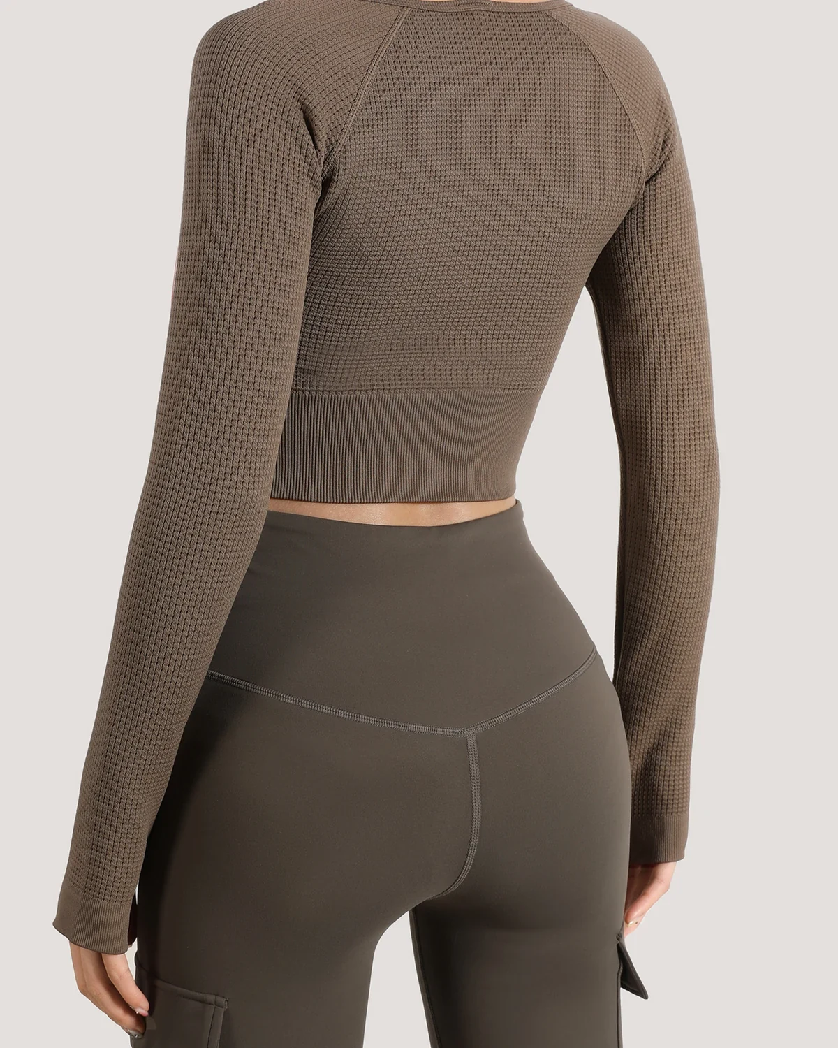 Women's slim-fit textured waffle active yoga top, long-sleeve Pilates, styled view